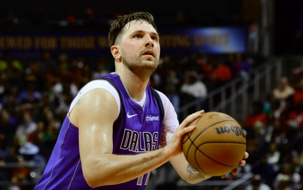 basketball player prepares to take a shot